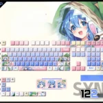 Vibrant Yoshino Keycaps Set from Date A Live, showing the iconic PBT backlit set from multiple playful angles with icy blue and green tones.