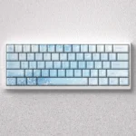 Yuki-onna Keycaps Set: Ethereal PBT Keycap Set showcasing the mystical snow maiden design in delicate icy blues and whites.