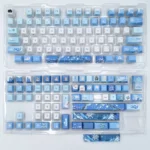 Zayne Keycaps Set product gallery showcasing the elegant double-shot PBT set from various angles, emphasizing the clean side-engraved legends and character design.