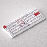 Iconic Zero Two PBT keycap set for mechanical keyboards, displaying vibrant pink and white anime aesthetic from multiple angles.