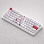 Multiple angles of the iconic Zero Two PBT Keycap Set, highlighting the vibrant pink and white anime aesthetic and crisp dye-sub legends.