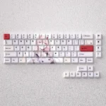 Vibrant pink and white Zero Two PBT keycaps set showcasing the iconic anime aesthetic with crisp dye-sub legends for mechanical keyboards.