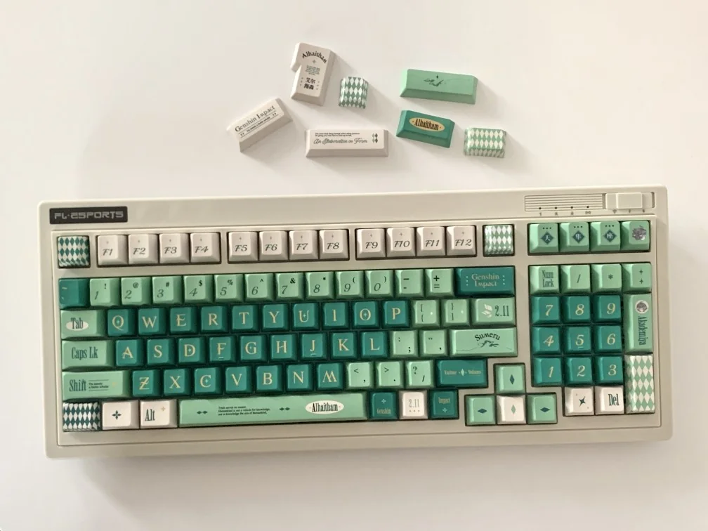 Alhaitham Keycaps Scribe's Elegance full set, showcasing premium green, grey, gold Scribe motifs from various angles.