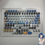 Anna Yanami translucent RGB anime keycaps set, showcasing vibrant character art and illuminated glow from a playful overhead view.