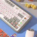Close-up view of the vibrant Mario Arcade PBT Dye-sub Keycaps Set, showcasing iconic pixel art characters and a playful retro gaming aesthetic.
