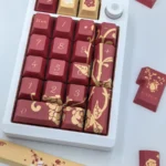 Close-up of a premium Argenti Honkai Star Rail keycap set, highlighting the elegant rose and cosmic knightly motifs in exquisite detail.