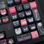 Multiple angles of the unique handcrafted Artisan Batman Keycap Set, showcasing its intricate sculpted details and playful design for collectors.
