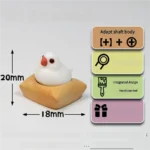 Exquisite handcrafted 3D Java Sparrow artisan keycap featuring a charming white-rumped munia bird perched on an intricately textured mat.