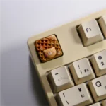Showcasing the adorable handcrafted bear waffle artisan keycap, a charming 3D dessert in rich chocolate brown, perfect for custom keyboards.