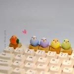 Stunning vibrant parrot artisan keycap, meticulously hand-sculpted in 3D, a unique collectible for mechanical keyboards.