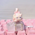 Whimsical fluffy cat artisan keycap, revealing its unique handcrafted details, warm white tones, and charm from various perspectives.