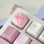 Exquisite handcrafted rose artisan keycaps, gallery view showcasing delicate resin roses in clear resin from multiple artistic angles.