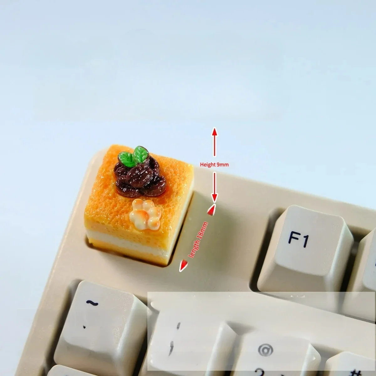 Multiple angles of a unique handcrafted mousse cake artisan keycap, highlighting its whimsical dessert-inspired design, vibrant pastel hues, and reality design.