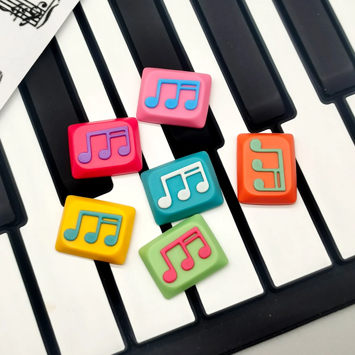 Musical Note Low Shaft Keycaps featuring a fluid music note design, highlighting its handcrafted artistry and unique appeal.