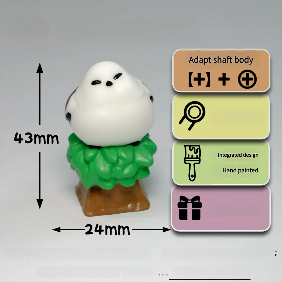 A charming, handcrafted 3D titmouse Squint Eye Bushtit artisan keycap. This whimsical artisan keycap features a playful tiny bird nestled in lush miniature foliage.