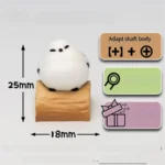 Side view of the whimsical handmade artisan Bushtit keycap, featuring an adorable 3D sculpted forest bird on a rustic log, full of charming personality.