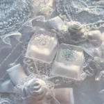 Artisan Snowflake Keycap, handcrafted with translucent resin, featuring an ethereal snowflake suspended in a dreamy, misty glow.