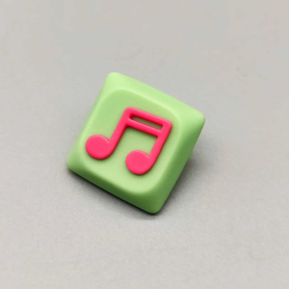 Handcrafted Two Beam Eighth Note Symbol Keycaps with a vibrant translucent resin rhythm symbol set on a striking green base, showcasing unique artistic flair.