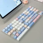 Playful White Rabbit MOA PBT keycaps set showcasing the iconic milky white and red theme from multiple angles, highlighting the comfy spherical profile.