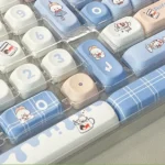 Iconic White Rabbit MOA PBT Keycaps Set exhibit milky white, blue, red spherical profile. Durable PBT and comfy MOA provide nostalgic typing.