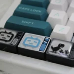 Stunning handcrafted resin BiliBili Keycaps featuring a miniature retro pixel TV with a visible Bilibili logo, designed for backlit keyboards.