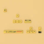 Close-up views of distinctive Biohazard PBT Dye-Sub Supplement keycaps set showcasing vibrant red and yellow toxic waste motifs on a dark, premium base.