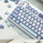 Gallery of the Ethereal Blue Butterfly Keycap Set, revealing its exquisite Rose Shadow design and intricate floral beauty from various angles.