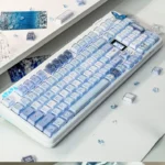 Ethereal blue butterfly KDA keycap set from multiple angles, showcasing its exquisite rose shadow design and intricate floral details. A dreamlike, artistic angles.