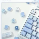 Gallery of the Ethereal Blue Butterfly Keycap Set, revealing its exquisite Rose Shadow design and intricate floral beauty from various angles.