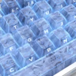 Exclusive blue forged carbon keycap set gallery, showcasing the dynamic texture and modern side-printed legends from various premium angles.