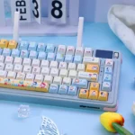 Bo-chan Daily Charm PBT keycap set gallery, showing exclusive Bo-chan art and serene blue whimsical daily scenes from multiple angles.