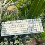 A close-up of lush Botanical Keycaps Set, showcasing vibrant green illustrations, delicate floral accents, and the unique, durable MDA PBT profile.