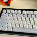 British Impression Series Keycap Set, multi-angle views. Highlights the unique purple-blue gradient and clean, sophisticated European aesthetic.