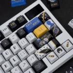 Exclusive Buccellati Keycap Set product images highlighting the full set's detailed Golden Wind tribute from various perspectives, with signature design.