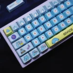 Adorable Bugcat Capoo PBT dye-sub keycaps set, an original opaque small full set featuring whimsical blue and pastel designs for mechanical keyboards.