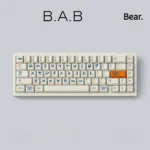 Whimsical Build-A-Bear PBT dye-sub keycaps set in a nostalgic retro teddy bear theme, captured from a charming angle, highlighting their playful pastel design.