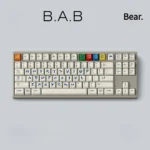 Whimsical Build-A-Bear PBT keycaps set with charming retro teddy bear designs in pastel tones, showcasing nostalgic dye-sub craftsmanship from a fresh angles.