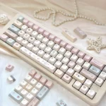 Whimsical Dessert Party Bunny Mechanical Keycap Set, a complete 147-key DMA variant showcasing delightful pastel bunnies enjoying sweets.
