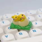 Adorable handcrafted 3D Whimsical Bushes Couple Cockatiel artisan keycap, intricately sculpted with charming nature elements.