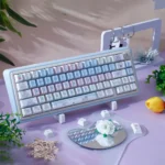 Adorable Cat Cake PBT dye-sub keycap set shown from various angles. Features whimsical pastel cat and cake motifs for a delightful keyboard.