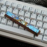 Gallery of the aerospace-grade Cartethyia Space Key keycap from different angles, emphasizing its sleek industrial design and unrivaled strength.