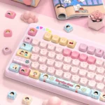 A vibrant set of Chibi Maruko PBT keycaps set, featuring cute characters in MOA profile. Multiple angles highlight their nostalgic charm and crisp designs.