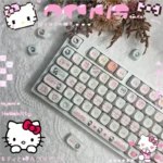 A playful collection of Hello Kitty MOA PBT keycaps set from various angles, showcasing iconic bows, charming characters, and durable pastel designs.