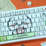 Gallery views of adorable Chiikawa Hachiware PBT keycaps set, showcasing charming dye-sub art, soft pastels, and backlit compatibility.