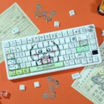 Detailed gallery views of adorable Chiikawa Hachiware PBT dye-sub backlit keycaps set in soft pastels, featuring smooth spherical profiles.