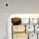 Handcrafted artisan chocolate biscuit keycap from multiple angles, showcasing its realistic 3D design and rich brown hues. A sweet whimsical custom keyboard design.