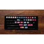 Gallery of whimsical Christmas PBT keycaps set, SO profile, displaying durable dye-sublimated designs of festive characters, snowy landscapes, and vibrant design.