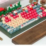 Whimsical Christmas PBT SO Profile keycaps set, displaying vibrant dye-sublimated holiday themes and characters from various angles.