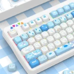 Playful Cinnamoroll PBT dye-sub keycap set in MOA profile, featuring the charming big-eared puppy design with soft blue and white pastel colors.