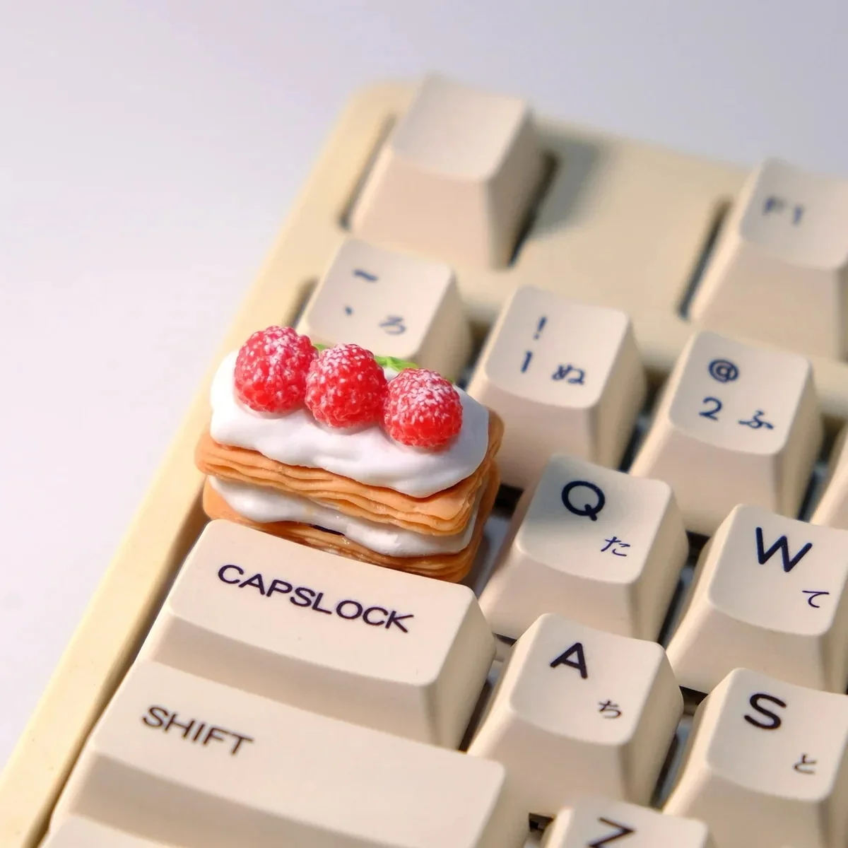Multiple views of the handcrafted Cream Raspberry Layer TAB artisan keycap. Intricate layered dessert details, sweet cream, and vibrant raspberry.